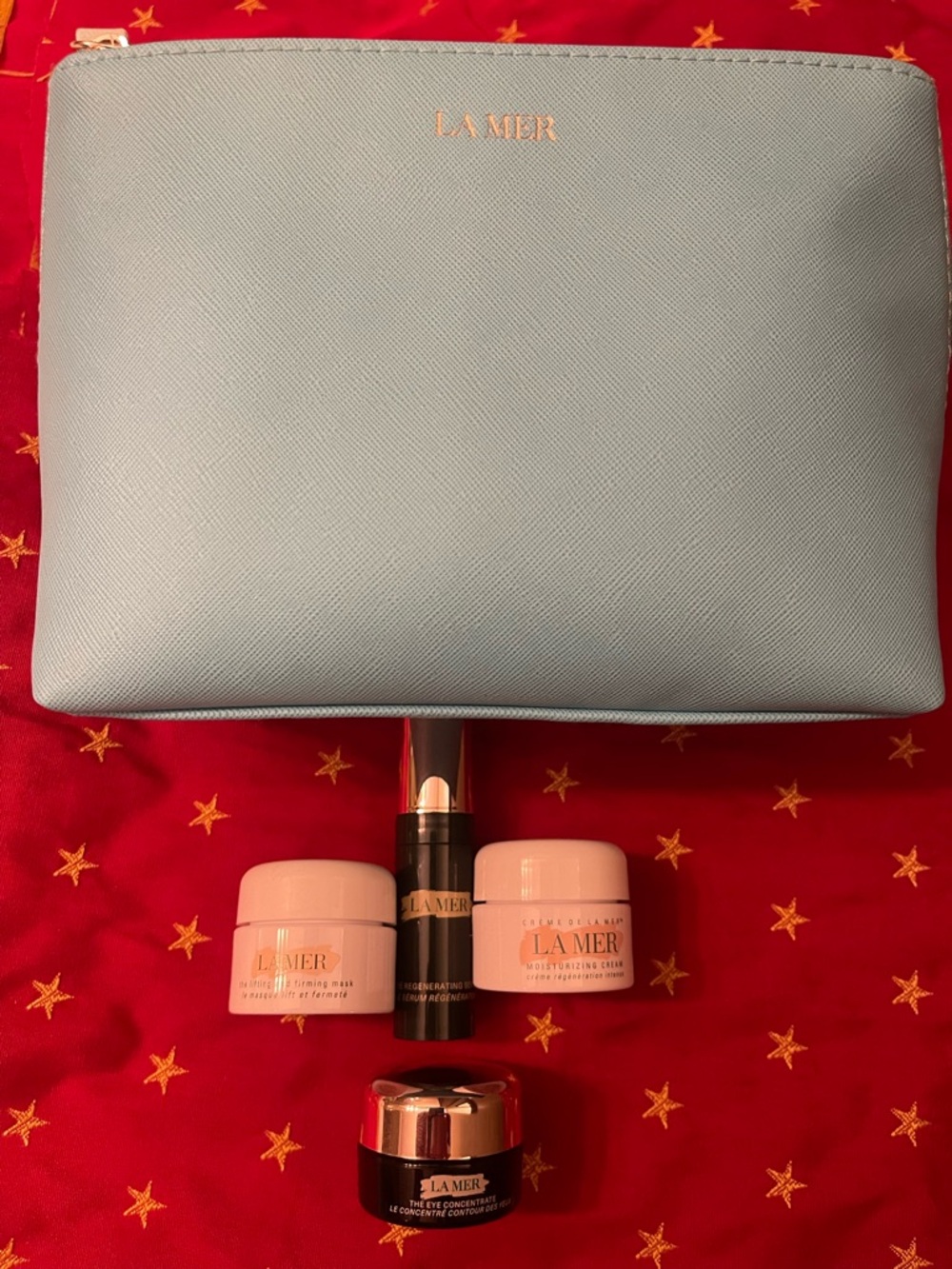 La Mer Light Blue Cosmetic Pouch with Mini Skincare Set
